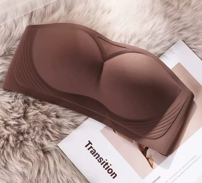 Brown strapless bandeau bra on a textured surface by The Seventh Muse