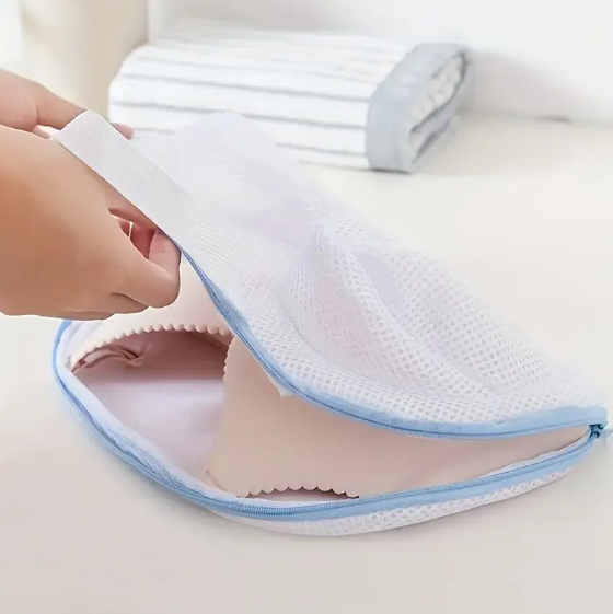 White mesh lingerie wash bags designed with a sturdy structure to protect padded and underwire bras during machine washing.