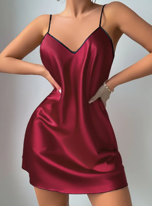 Burgundy silk cami dress with black lace V-back detail and thin adjustable shoulder straps from The Seventh Muse