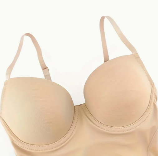 Seamless nude bodysuit shaper from The Seventh Muse with a supportive underwire bra top and subtle sheer mesh slimming panels at the hip