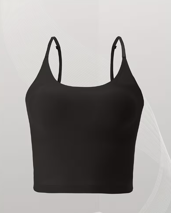 Black tank top with thin straps on a light gray background