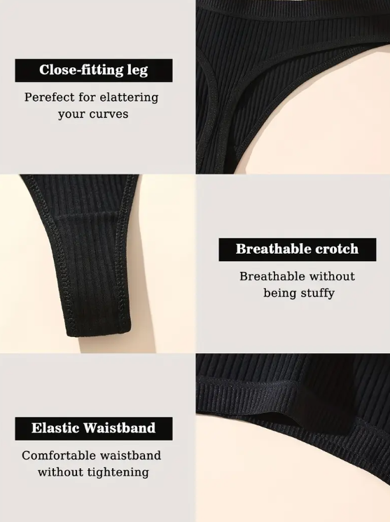Set of five black seamless ribbed thong panties.