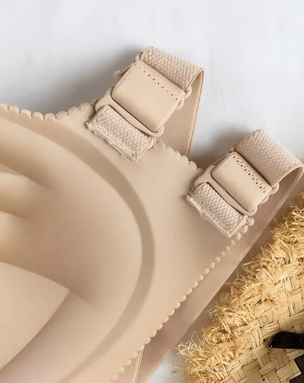 Model wearing a smooth, black contour strapless bra with a sweetheart neckline, suitable for fitted and off-shoulder dresses