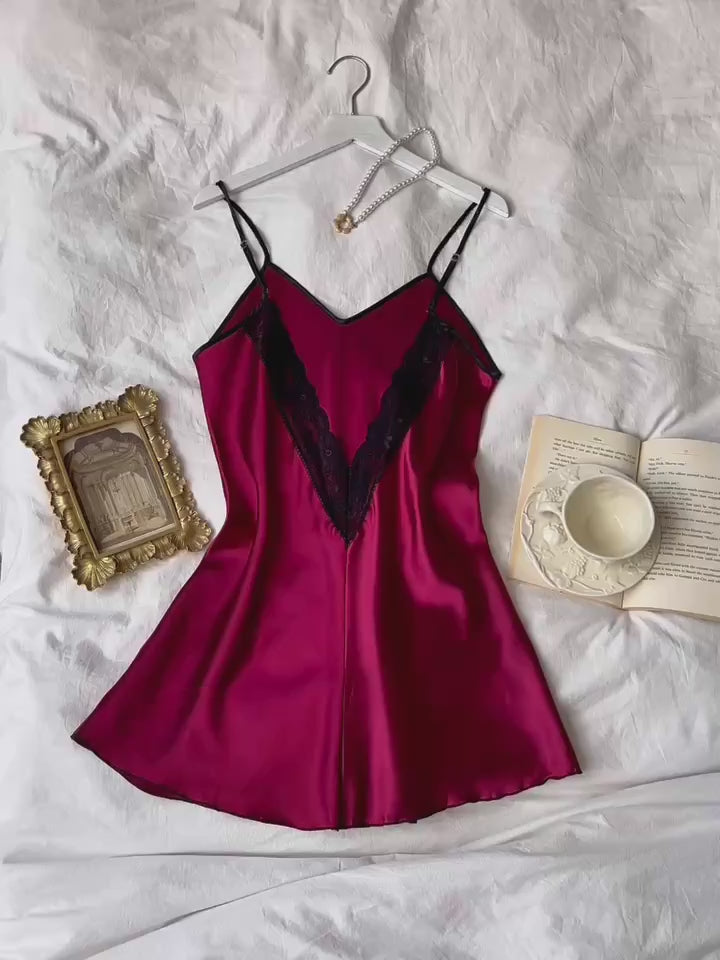 Burgundy silk cami dress with black lace V-back detail and thin adjustable shoulder straps from The Seventh Muse