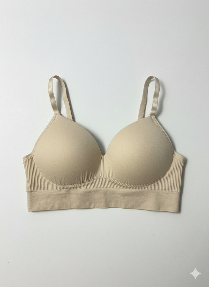 Beige bra on a light gray background