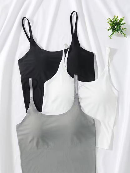 Black, White and gray tank tops on a white background