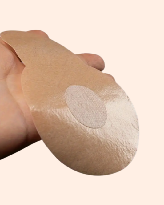 Adhesive, skin-colored, strapless breast lift tape for backless and low-cut clothing.