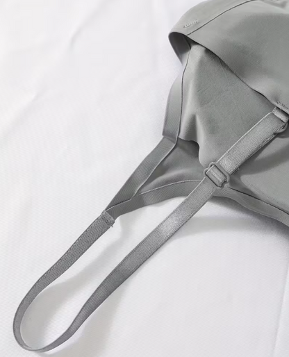 Gray tank top/camisole strap on a white background