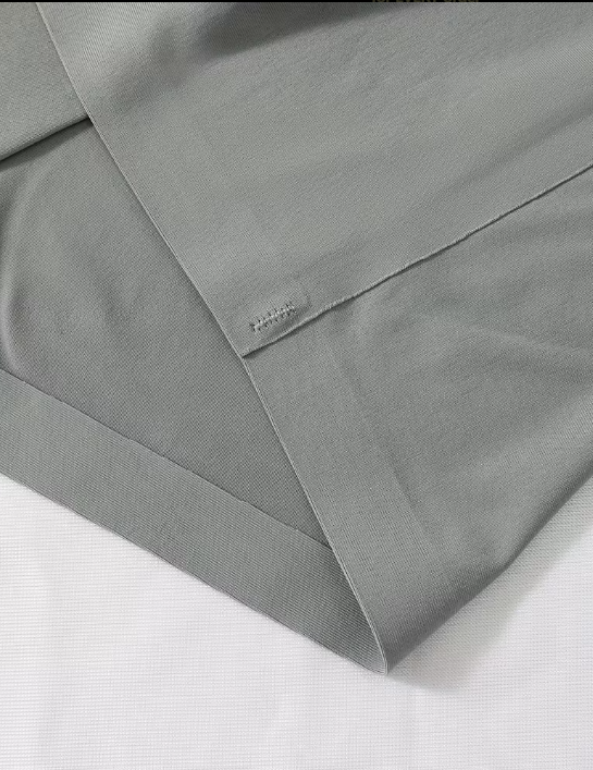 Gray camisole close up l on a white background