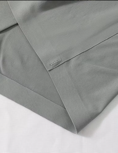 Gray camisole close up l on a white background