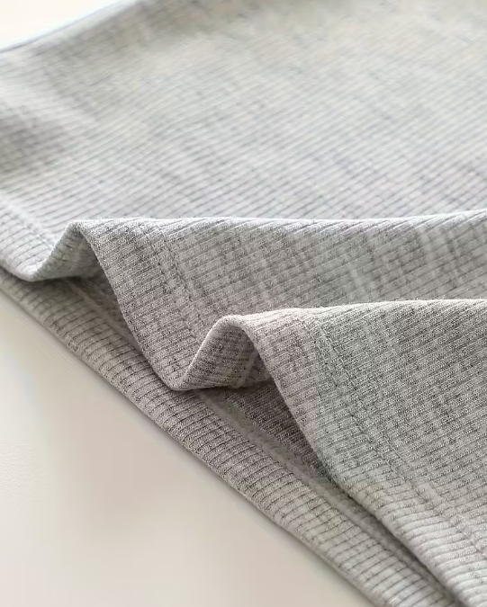 Light grey ribbed cotton camisole for women with thin adjustable straps – soft, stretchable, and perfect for layering or everyday comfort from The Seventh Muse.