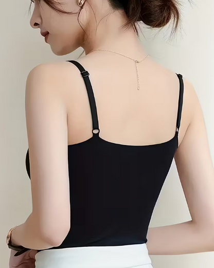 Close-up of a model in a smooth, seamless black camisole
