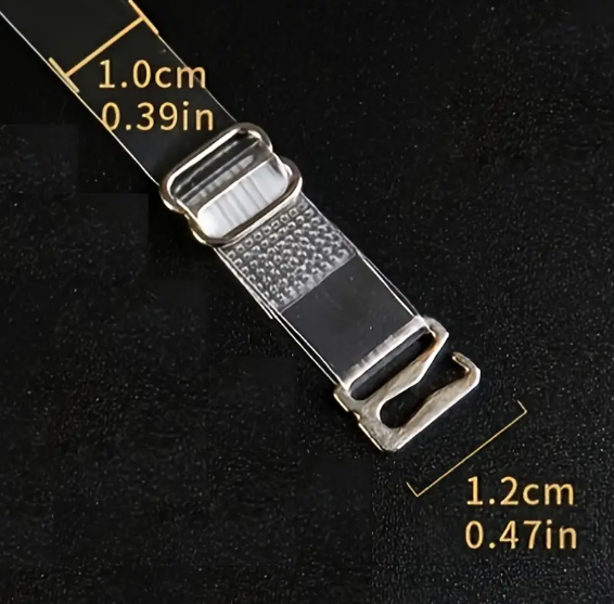 Close-up of two adjustable, transparent clear bra straps with silver-toned metal clasps and adjusters on a dark background.